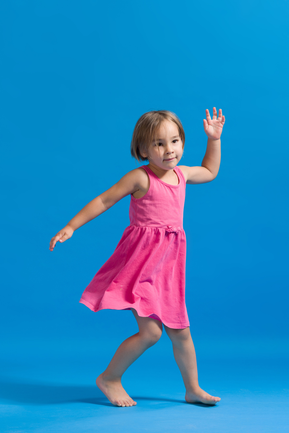 Little Happy Child Girl Dancing And Having Fun